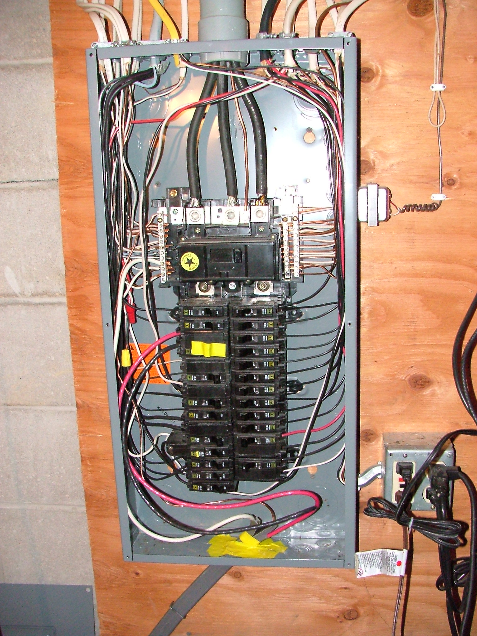 Residential electrical panel with circuit breakers and wiring